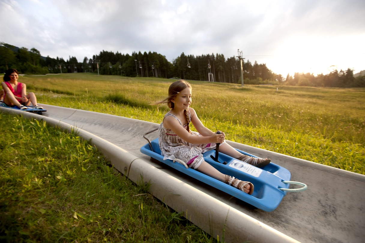 A young girl on the toboggan run on the Blomberg