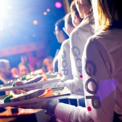 GOP employees carry the food to the guests