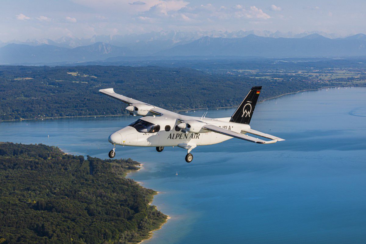 Alps Air plane over water in the air