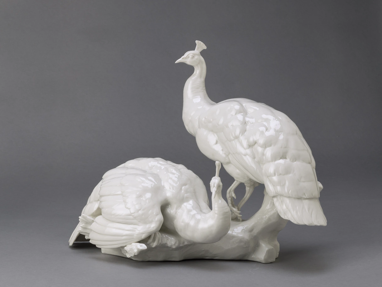 2 white peacocks as a porcelain statue