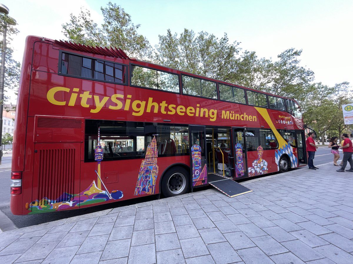 Red sightseeing bus in Munich with wheelchair ramp