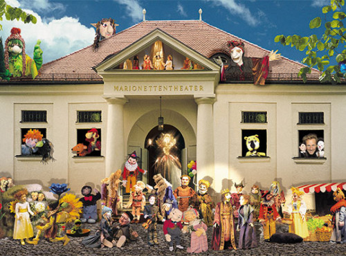 All puppets illustrated displayed in front of the theater