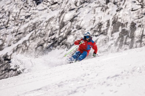 Skier is traveling fast on the piste in Sudelfeld